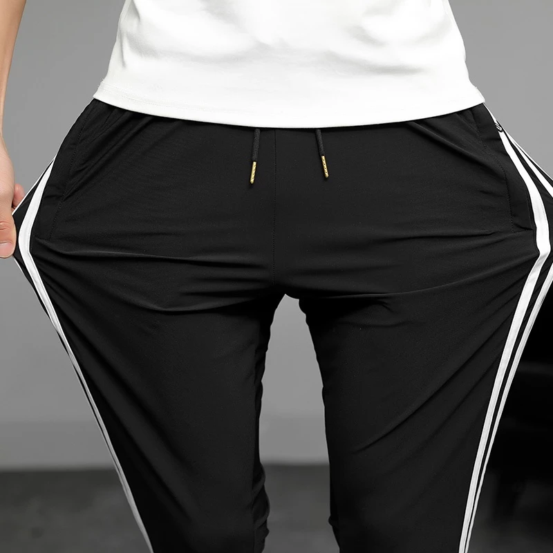 High Quality Tracksuit Men Seluar Lelaki Sport Pants Men Casual Seluar Lelaki Black Seluar Track Lelaki Seluar Lelaki Elasticity Sweatpants Plus Size Long Pants Men M-5XL